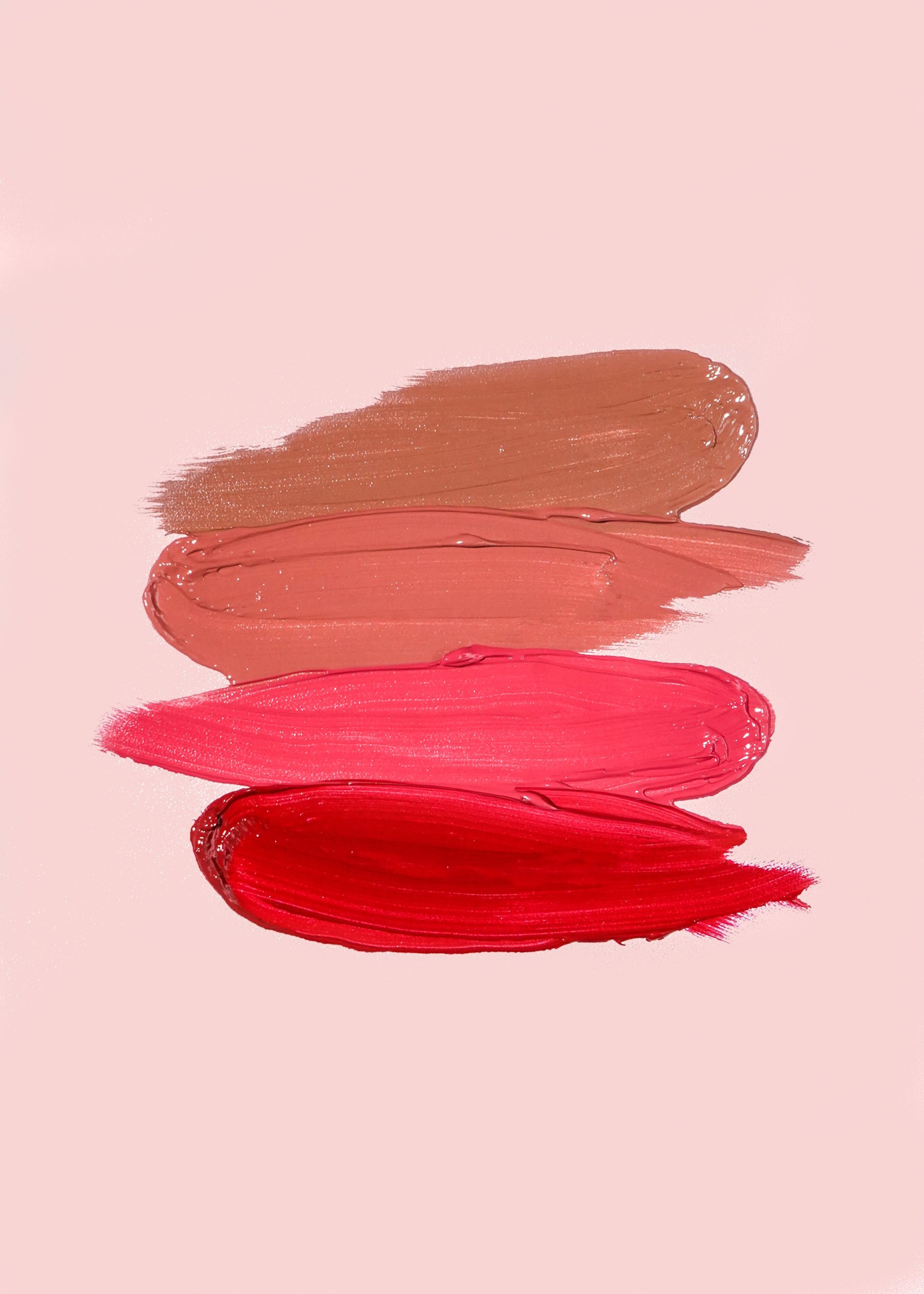 Lipstick swatch strokes in four shades